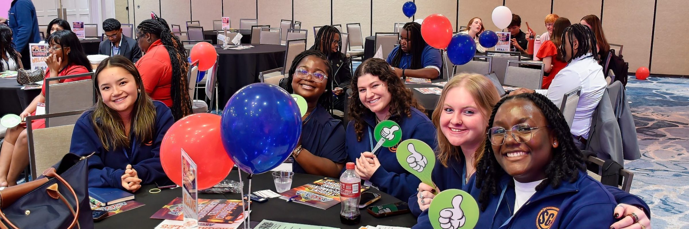 Student government attendees celebrating at an ASGA Spring Summit